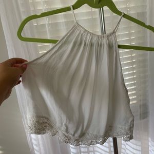 Divided white crotchet crop top size 6